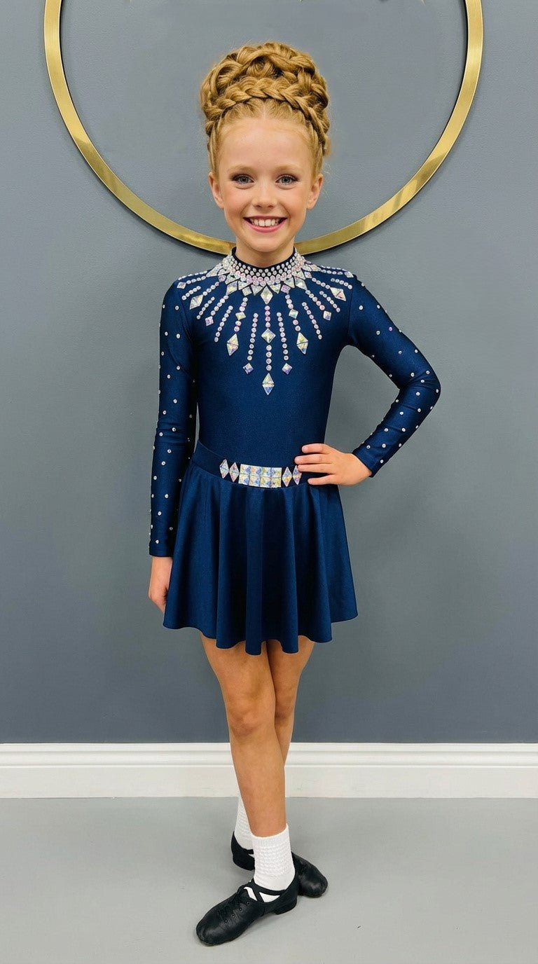 Navy Starlight Irish Dance leotard featuring an embellished lycra sleeves, shown styled with matching lycra skirt with rhinestone embellishments.